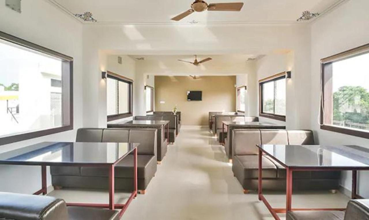 Fabhotel Prime Golden Feather