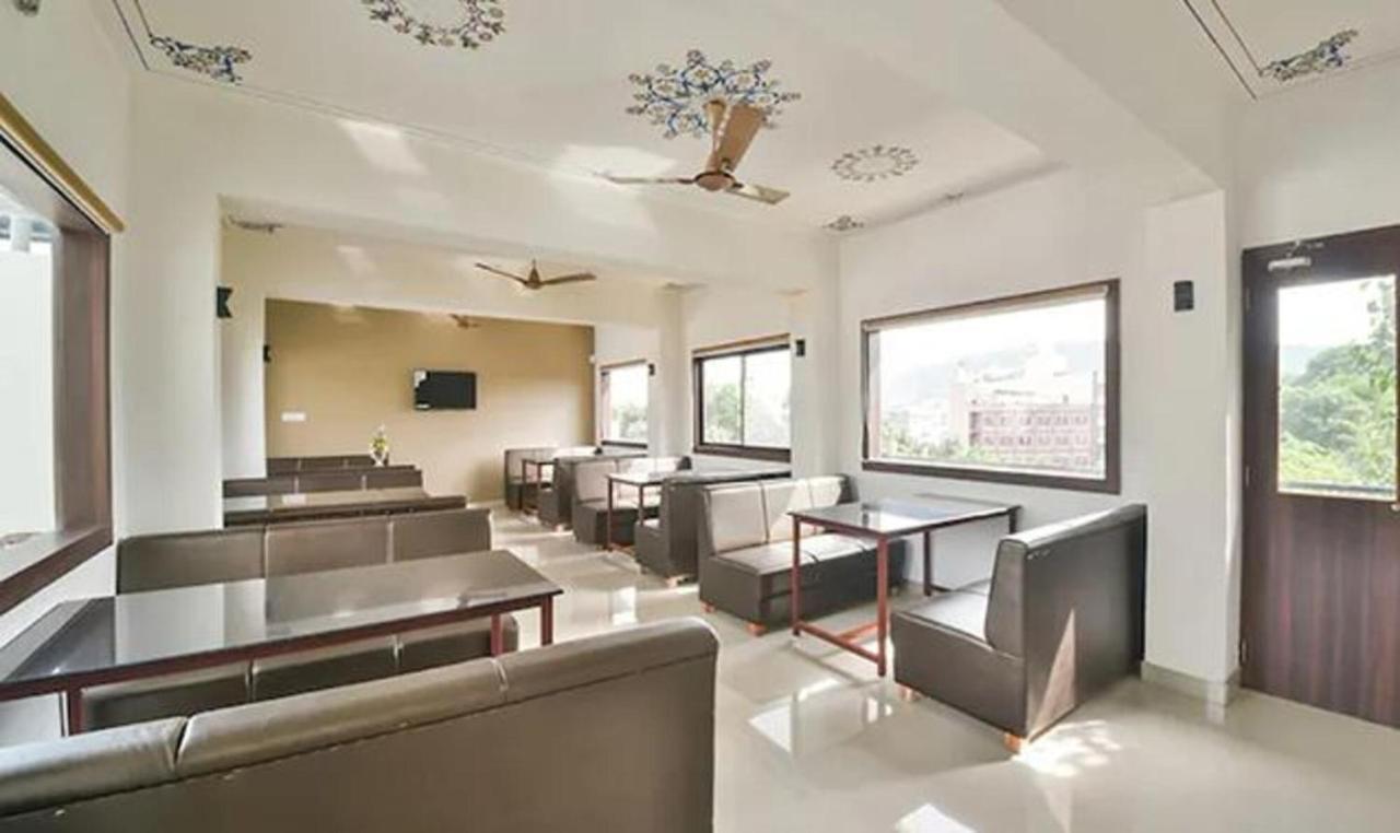 Fabhotel Prime Golden Feather