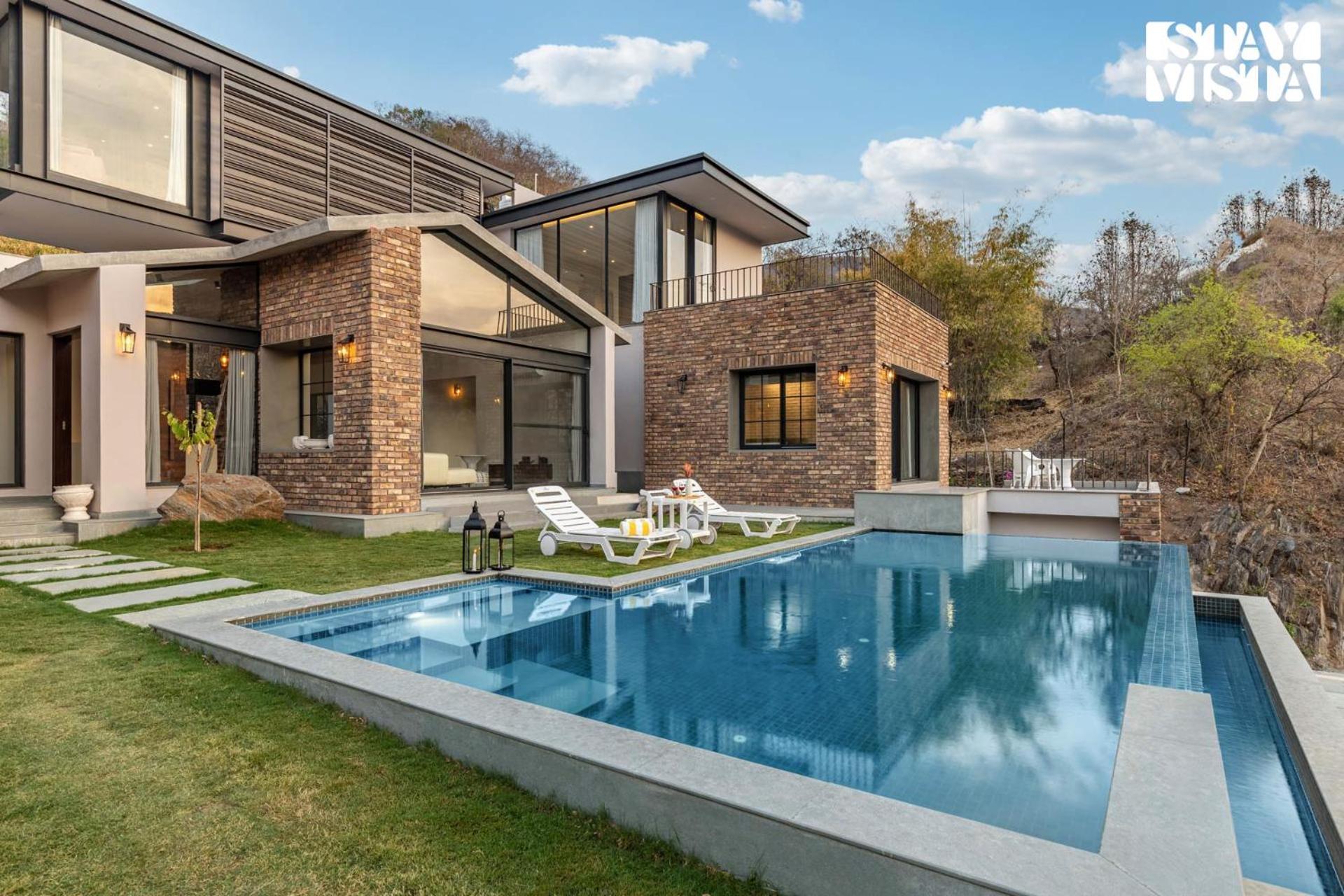 Stayvista's Ikebana - Living By The Forest Edge - Mountain-view With Infinity Pool, Lawn, & Indoor-outdoor Games *